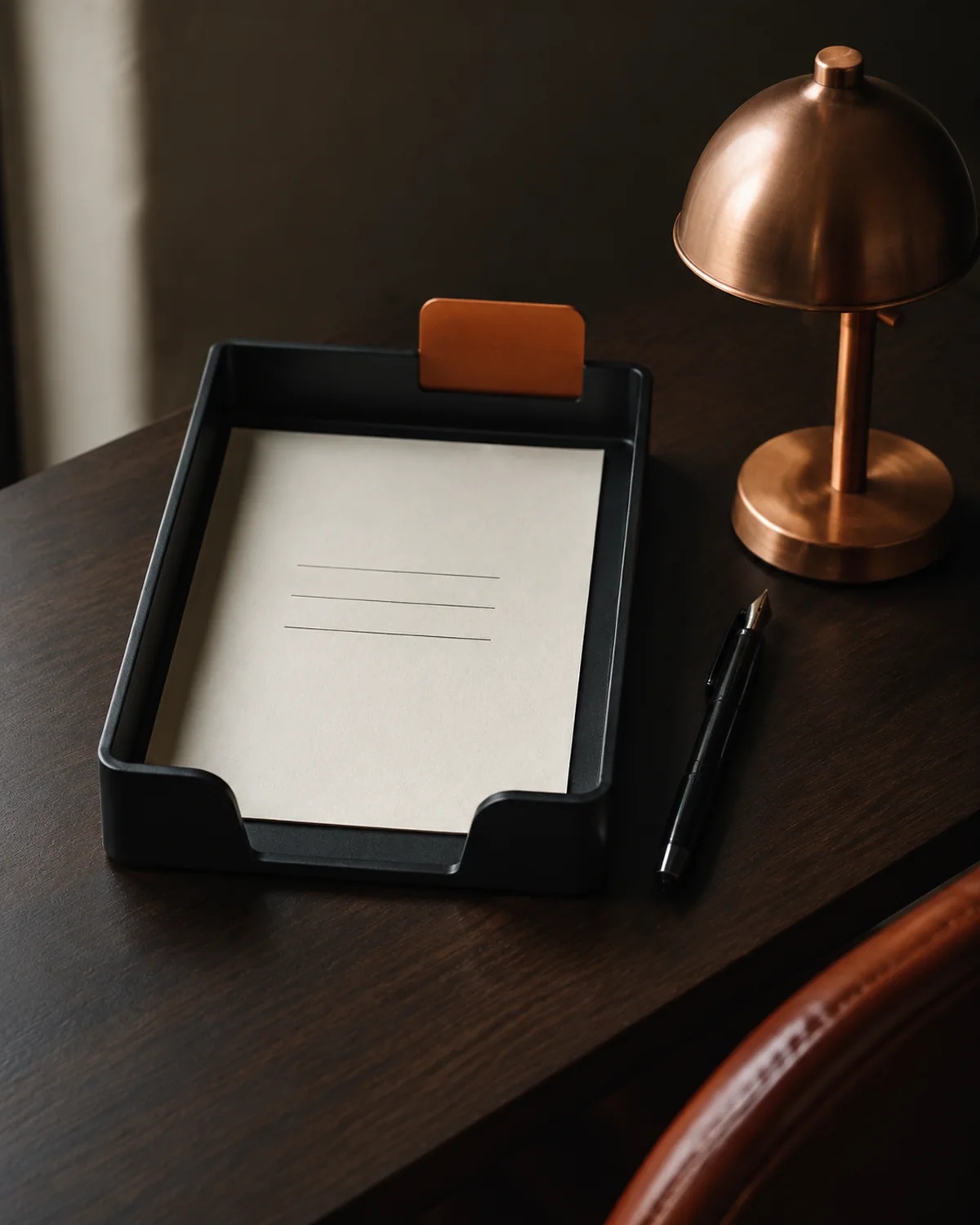 A single inquiry card waiting in a compact correspondence tray